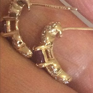 10k ruby earrings.